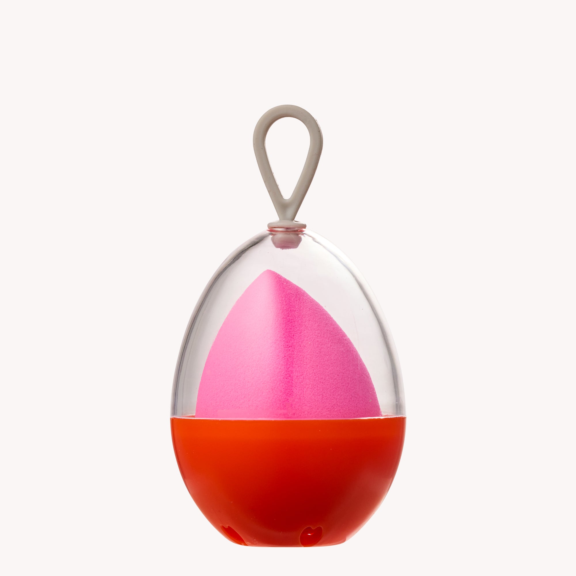 Colorful blender with a pink top and red bottom on a white background