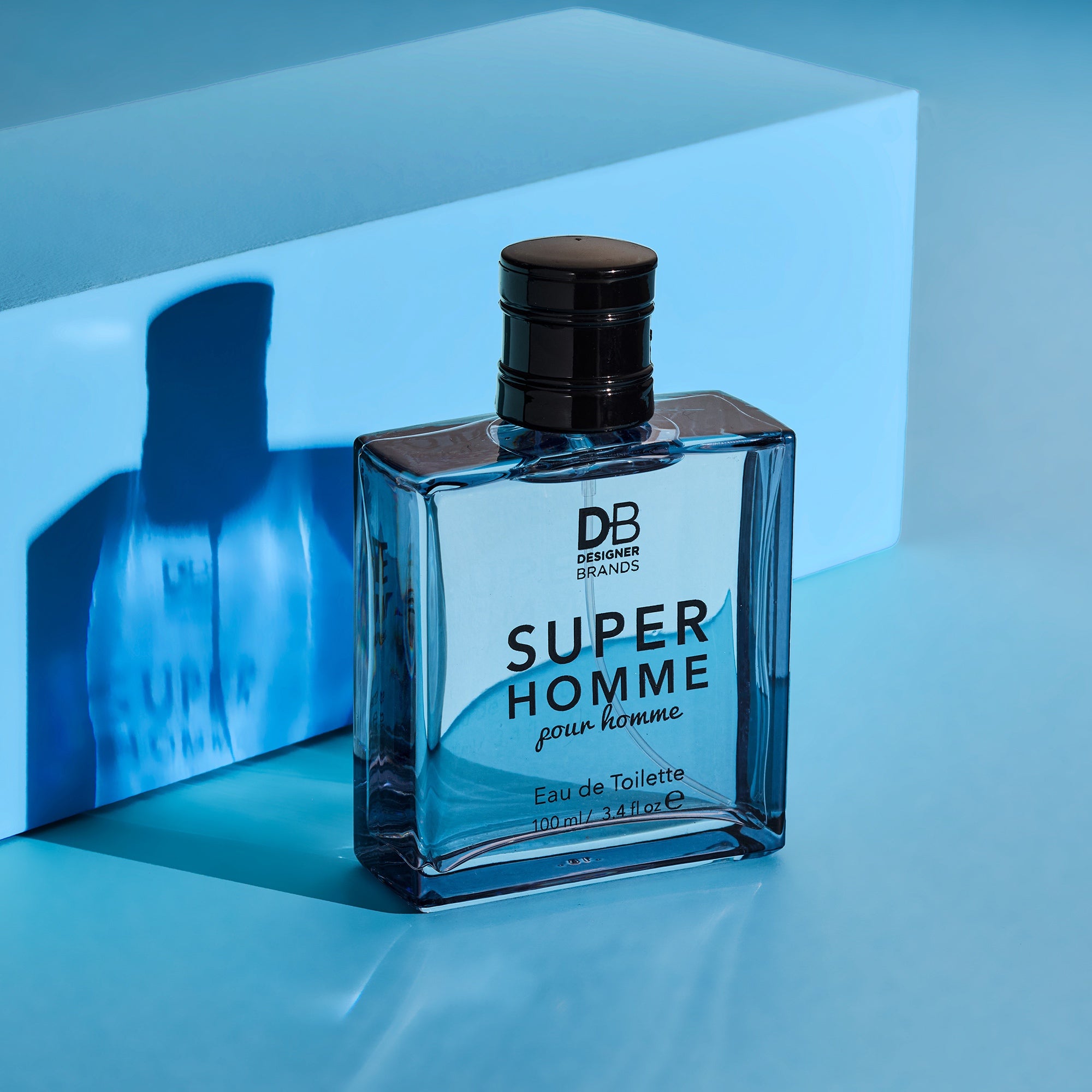 Perfume bottle labeled 'Super Homme' by Designer Brands on a blue background