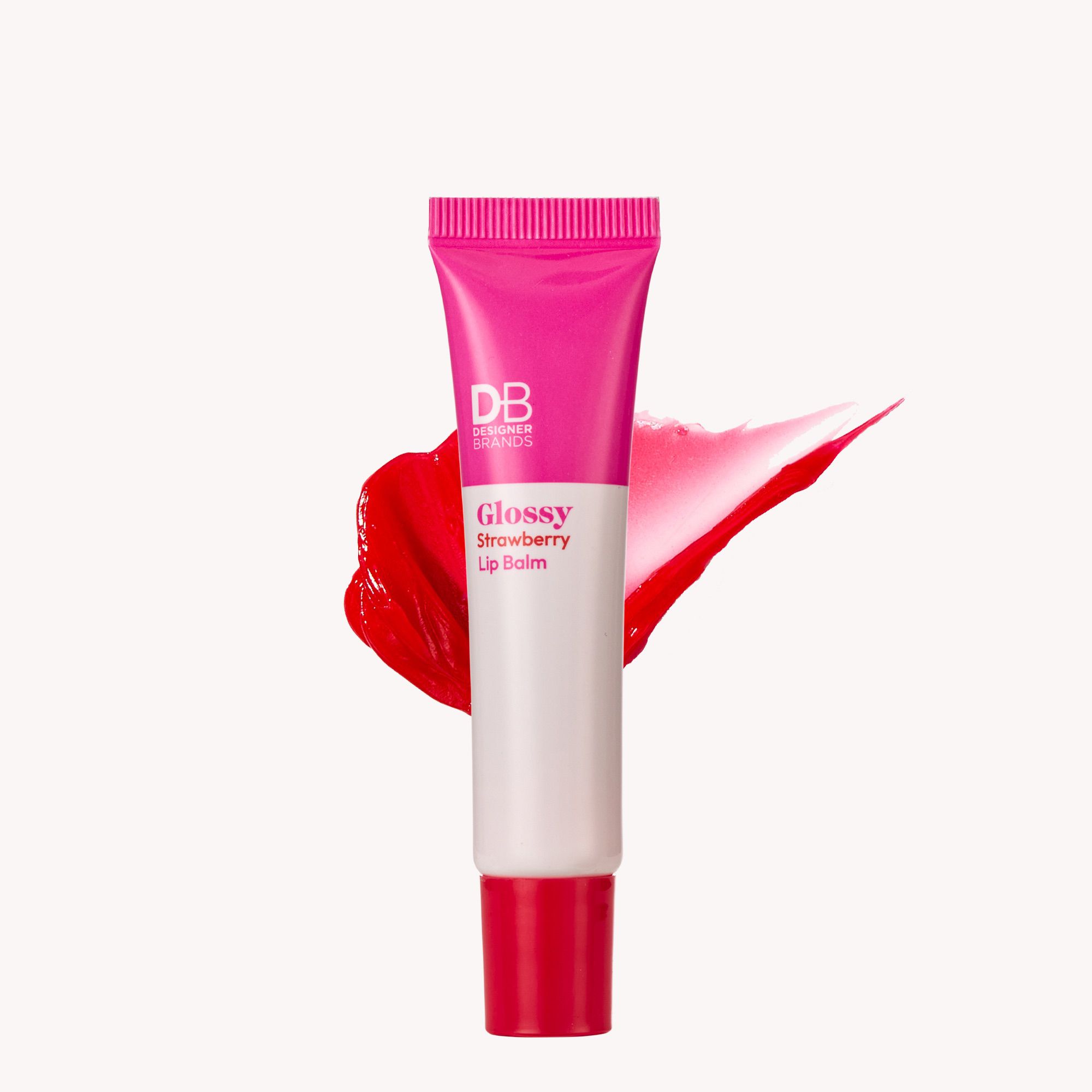 Pink lip balm tube with red cap on a white background