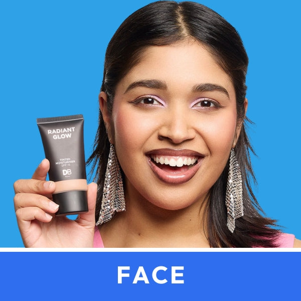 Smiling woman holding "Radiant Glow" tube, wearing statement crystal earrings against a blue background; text below reads "FACE".