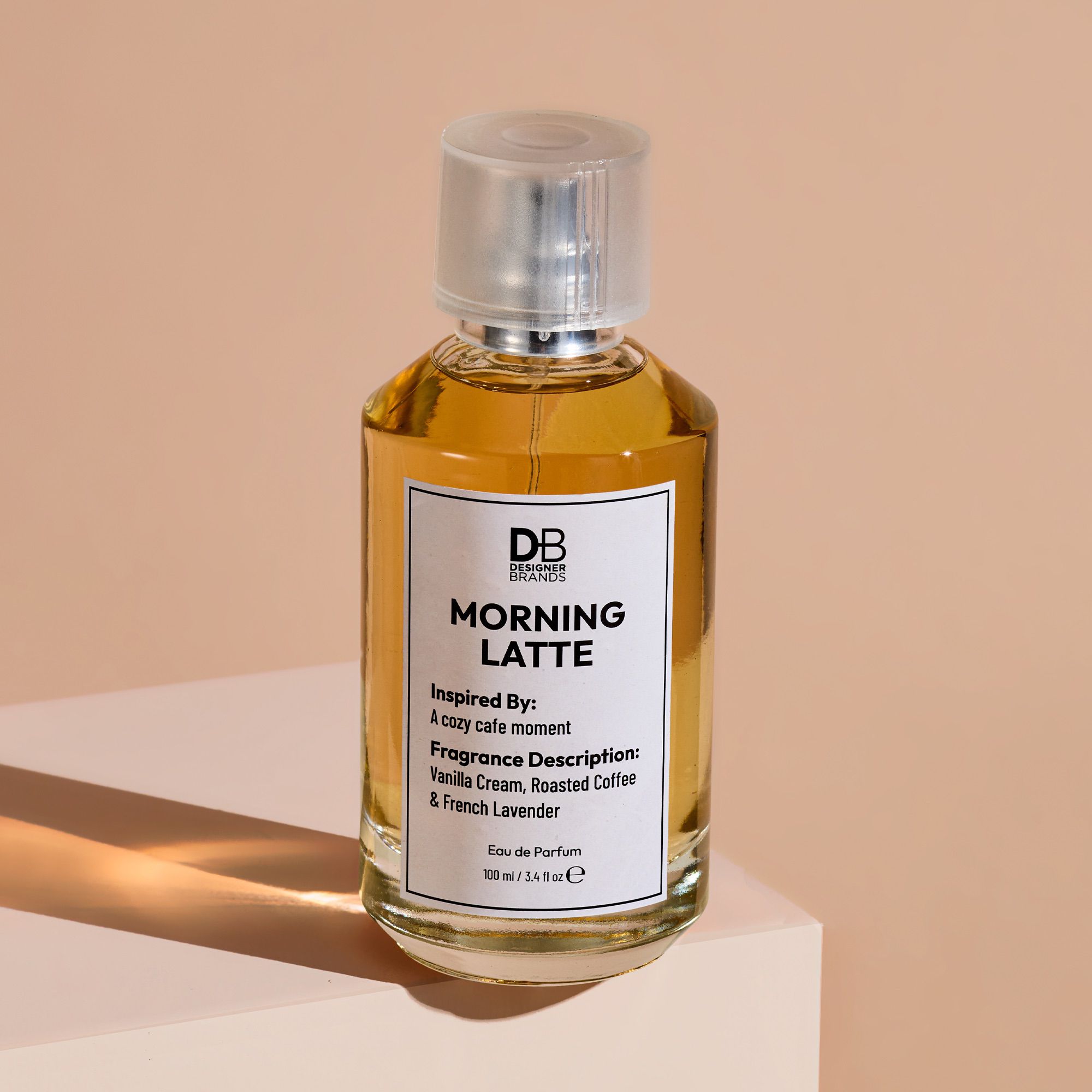 Perfume bottle labeled 'Morning Latte' on a beige background