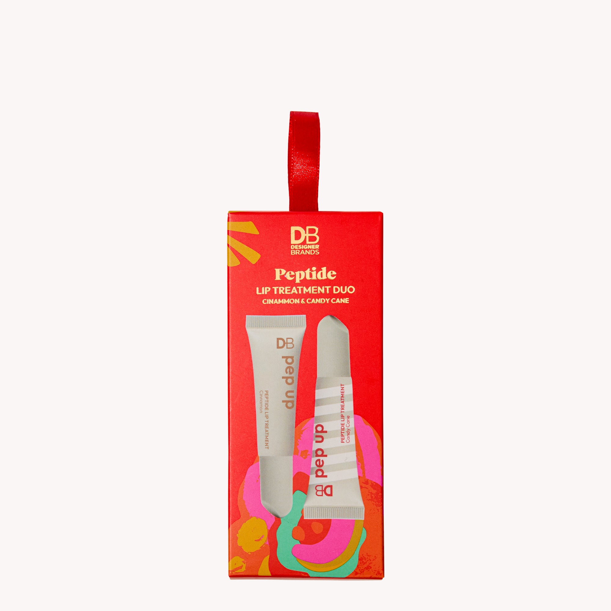 Red lip treatment duo packaging with two tubes on a white background